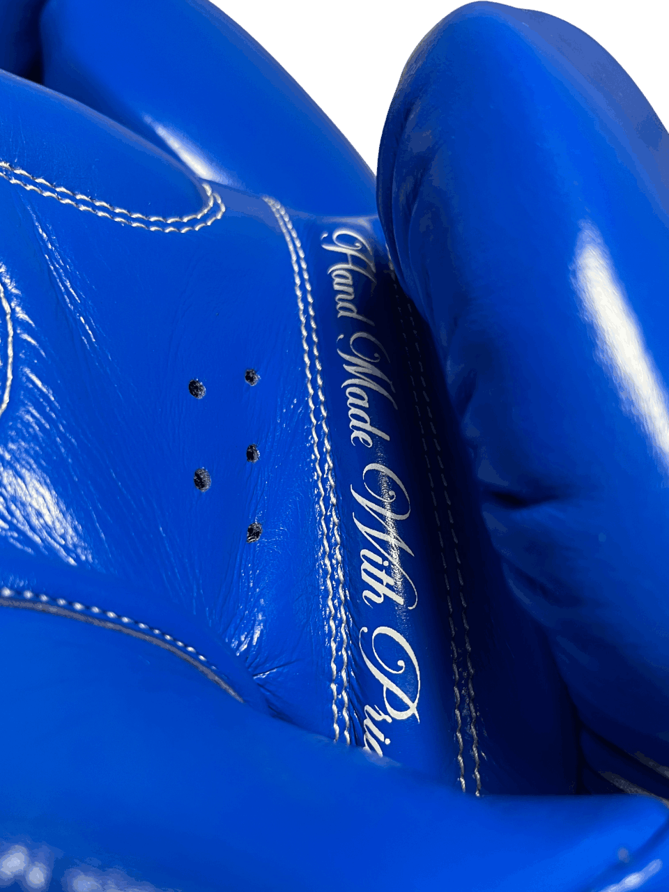 Royal Blue Muay Thai gloves with 'Hand Made With Pride' text on the palm, genuine leather and durable construction