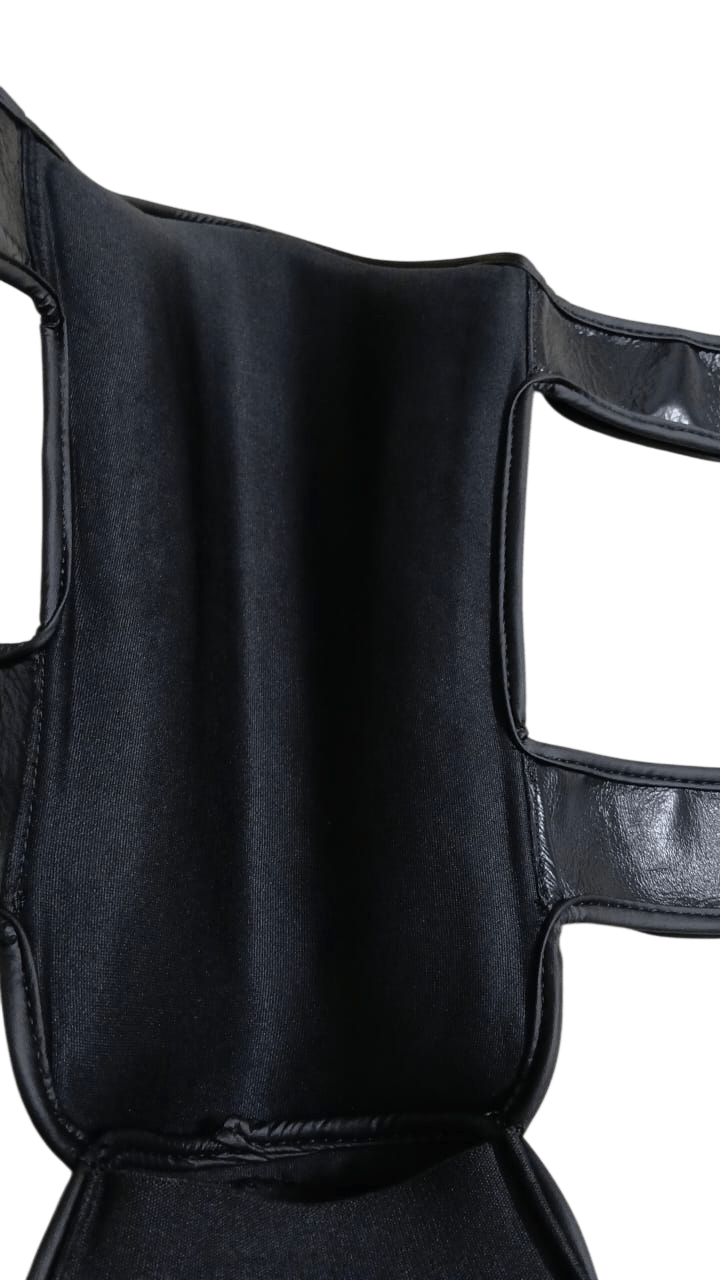 High-quality black mesh on a professional Thai boxe shin guard with black cowhide leather base