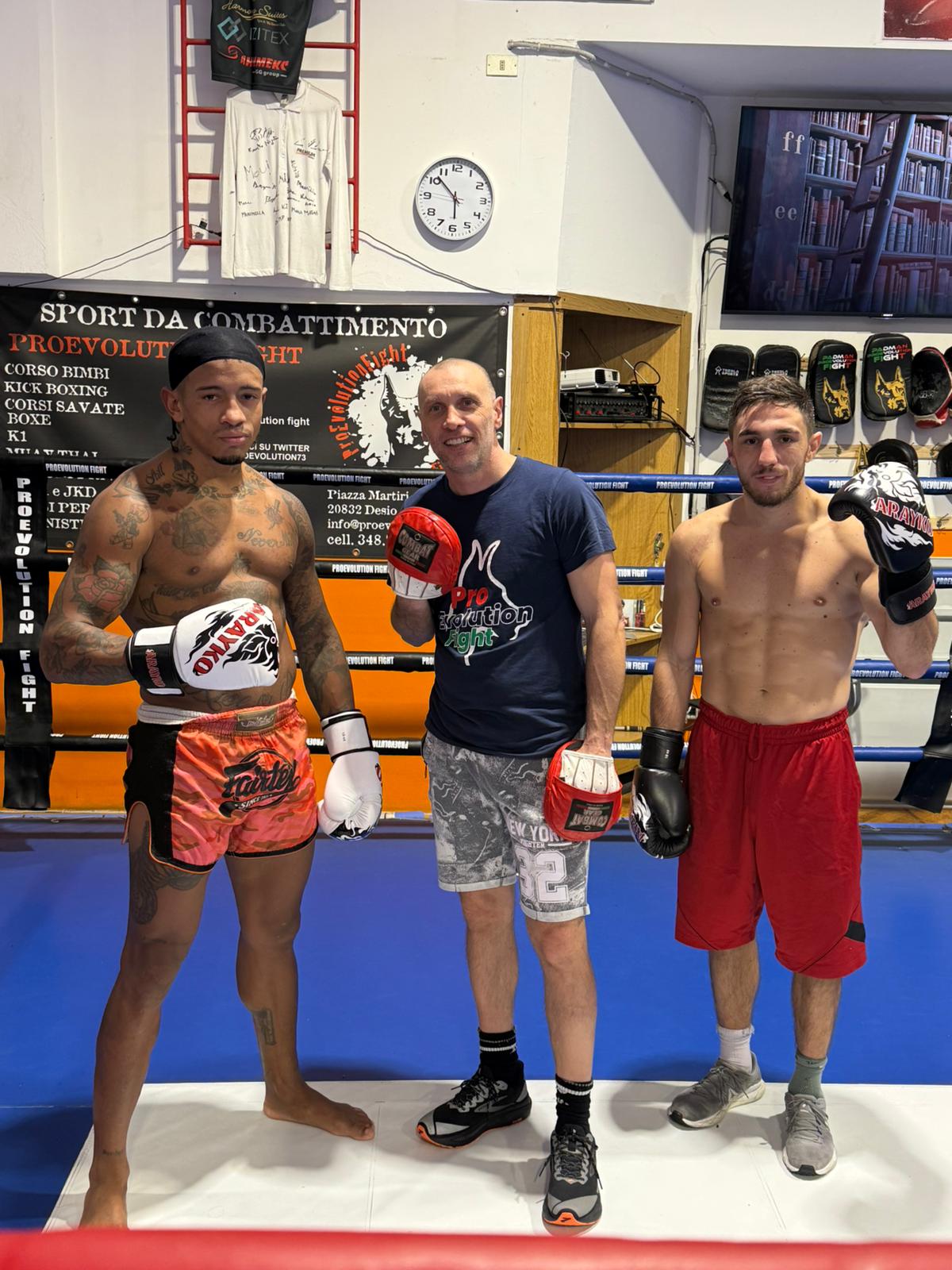 UFC trainer Max Reppucci with pro fighters Tommy Panta and Luca Grusovin in leather boxing gloves