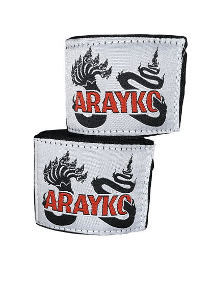 ARAYKO Muay Thai hand wraps featuring a custom-embroidered 7-headed Naga dragon and brand logo.