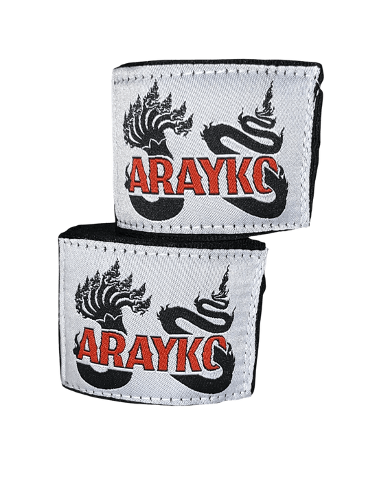 ARAYKO Muay Thai hand wraps featuring a custom-embroidered 7-headed Naga dragon and brand logo.