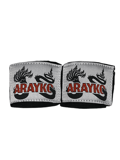 Front view of ARAYKO professional boxing hand wraps showcasing the detailed 7-headed dragon protector embroidery. These wraps feature high-quality stitching and bold red brand logos