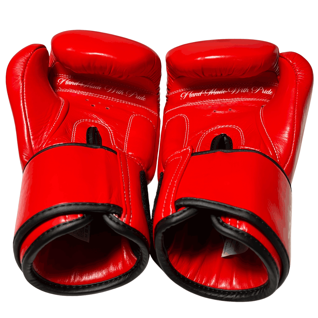 Boxing gloves palm featuring 'Hand Made With Pride' text, symbol of traditional craftsmanship and fighter-focused design