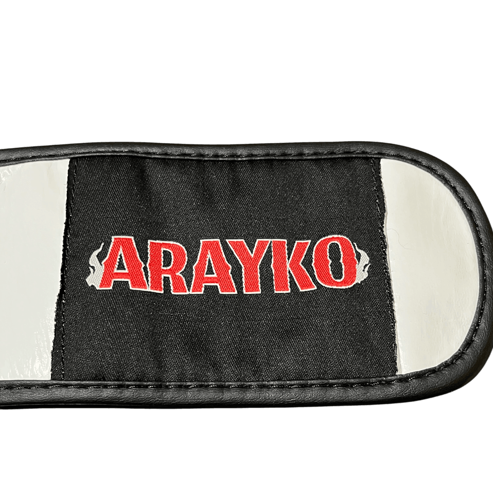 ARAYKO pro gloves with embroidered logo on hook-and-loop wrist strap. Durable leather martial arts gear.
