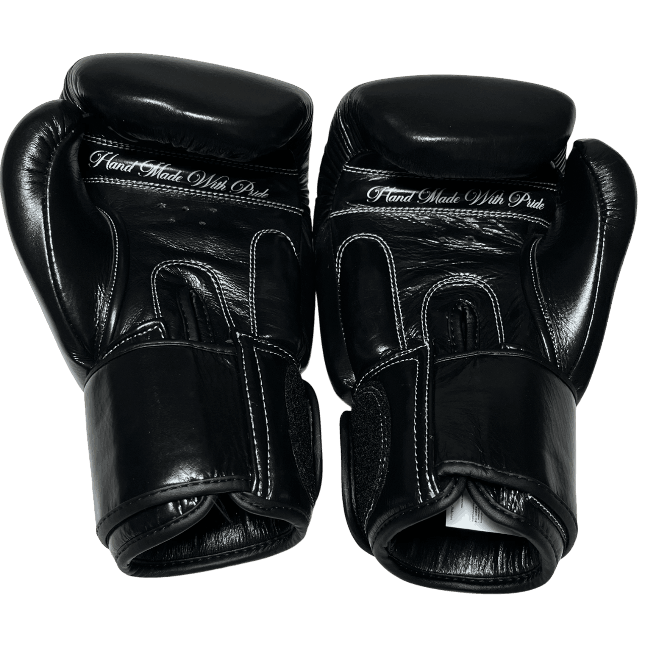 Handmade black boxing gloves in premium leather, designed for intense training and performance