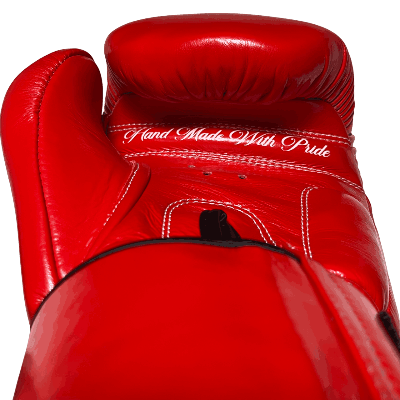 Rear palm view of a Muay Thai glove with 'Hand Made With Pride' script, emphasizing premium leather and craftsmanship