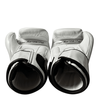 Real leather boxing gloves palm view showing "Hand Made With Pride" text. Professional artisanal boxing equipment